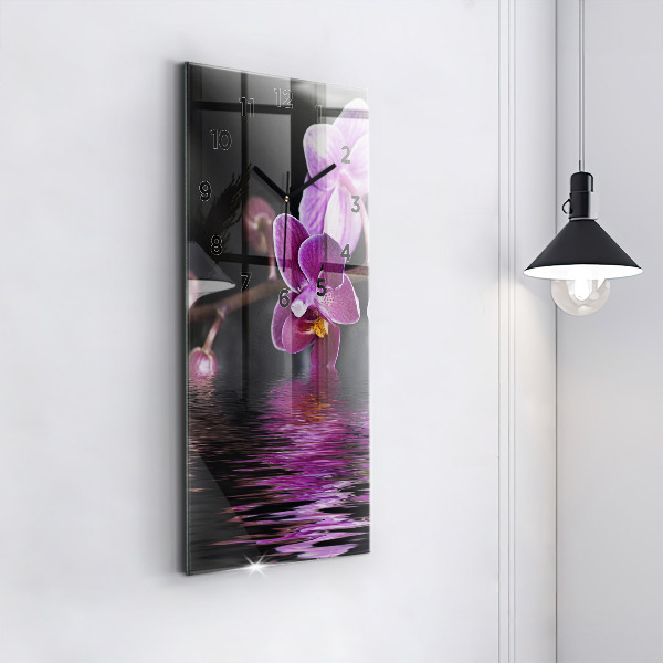 Modern vertical wall clock Orchid flower on the water