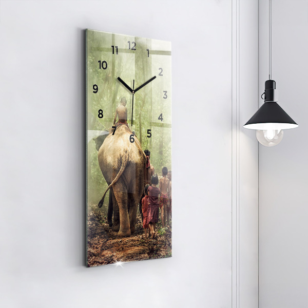 Modern vertical wall clock Children leading an elephant