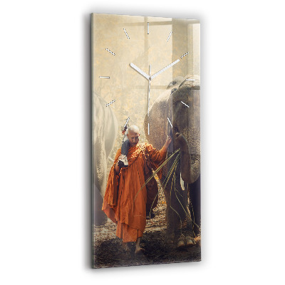 Modern vertical wall clock Monk leading elephants