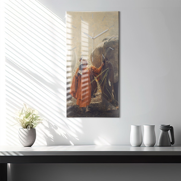 Modern vertical wall clock Monk leading elephants