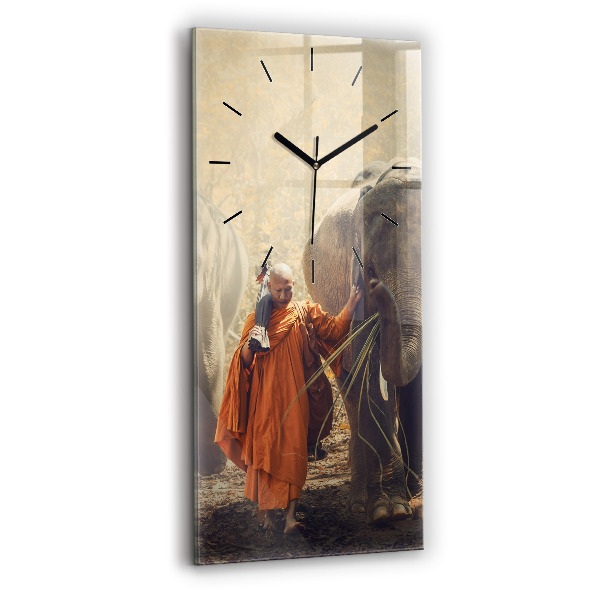 Modern vertical wall clock Monk leading elephants