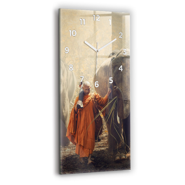Modern vertical wall clock Monk leading elephants