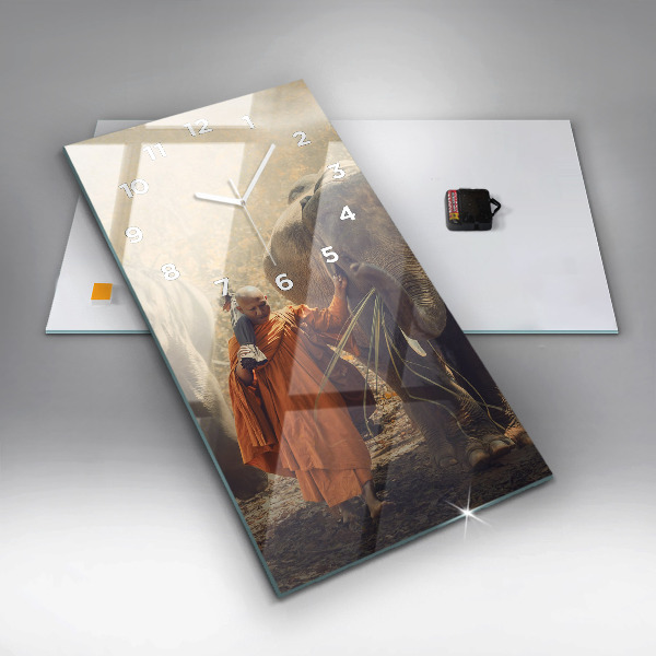 Modern vertical wall clock Monk leading elephants