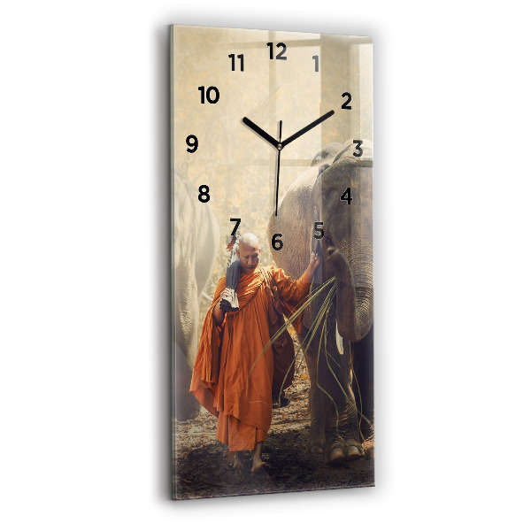 Modern vertical wall clock Monk leading elephants