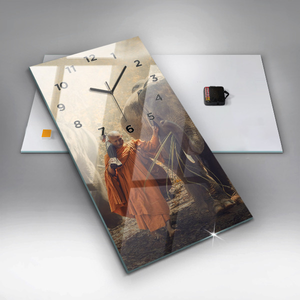 Modern vertical wall clock Monk leading elephants