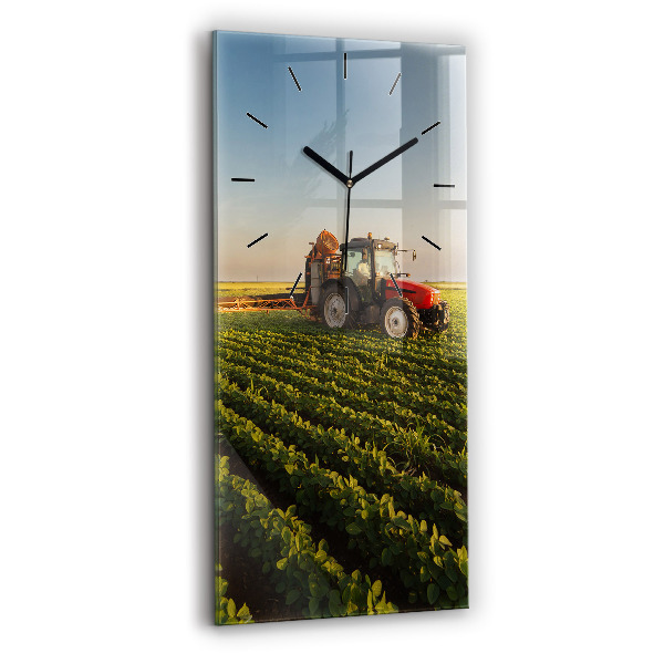 Modern vertical wall clock Tractor in a farm field