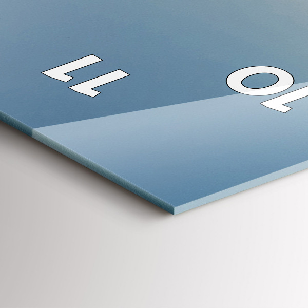 Modern vertical wall clock Tractor in a farm field