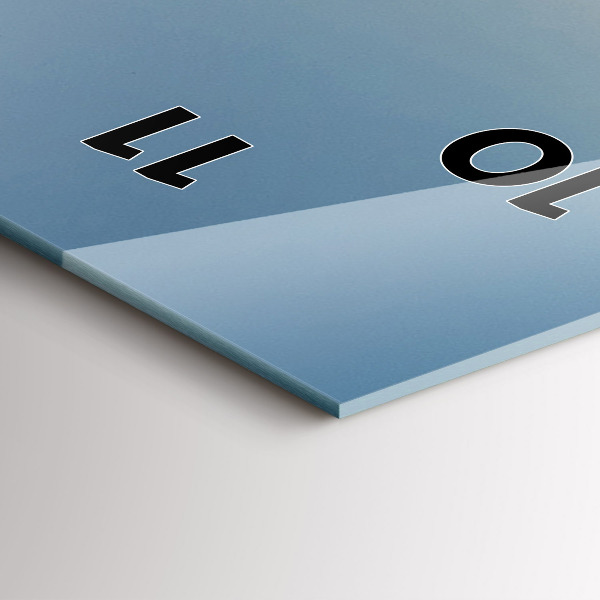 Modern vertical wall clock Tractor in a farm field