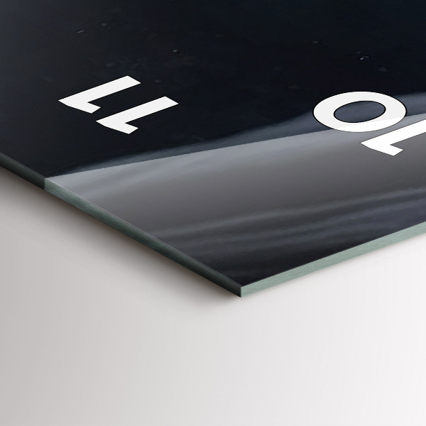 Modern vertical wall clock Man in front of the moon