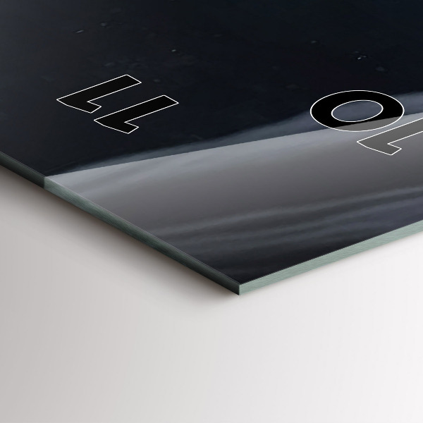 Modern vertical wall clock Man in front of the moon