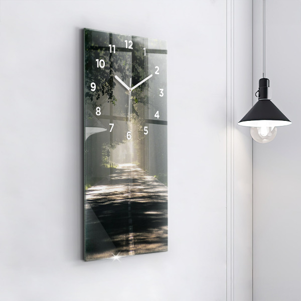 Modern vertical wall clock Forest road and streaks of sunlight