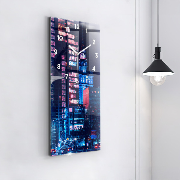 Modern vertical wall clock Warsaw at night