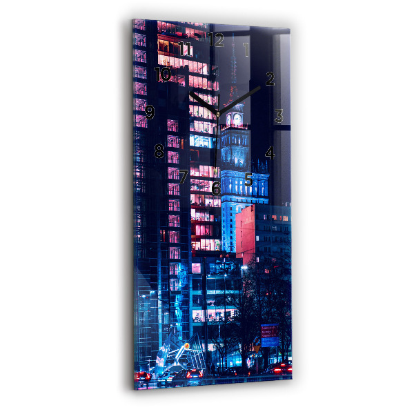Modern vertical wall clock Warsaw at night