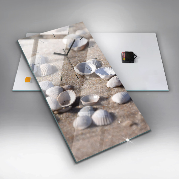 Modern vertical wall clock Seashells on the beach
