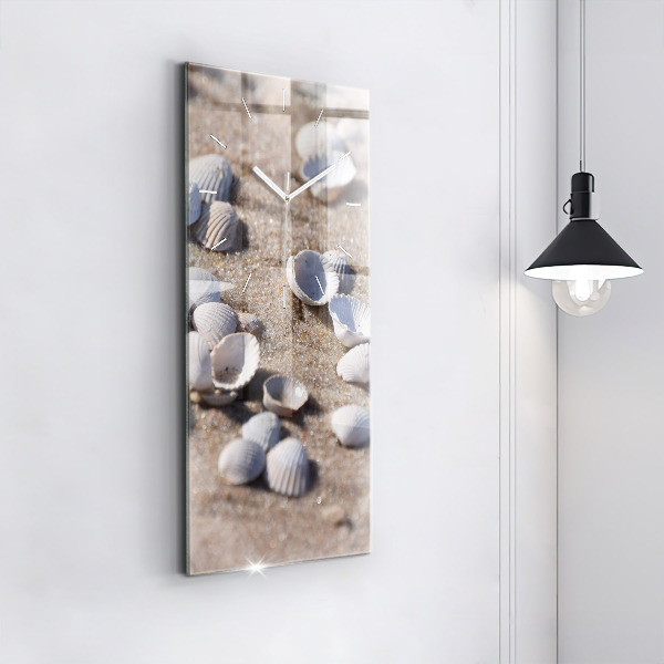 Modern vertical wall clock Seashells on the beach