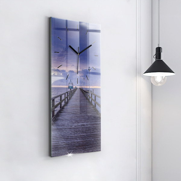 Modern vertical wall clock Pier on the Baltic Sea