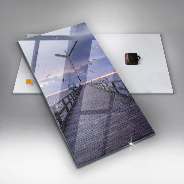 Modern vertical wall clock Pier on the Baltic Sea