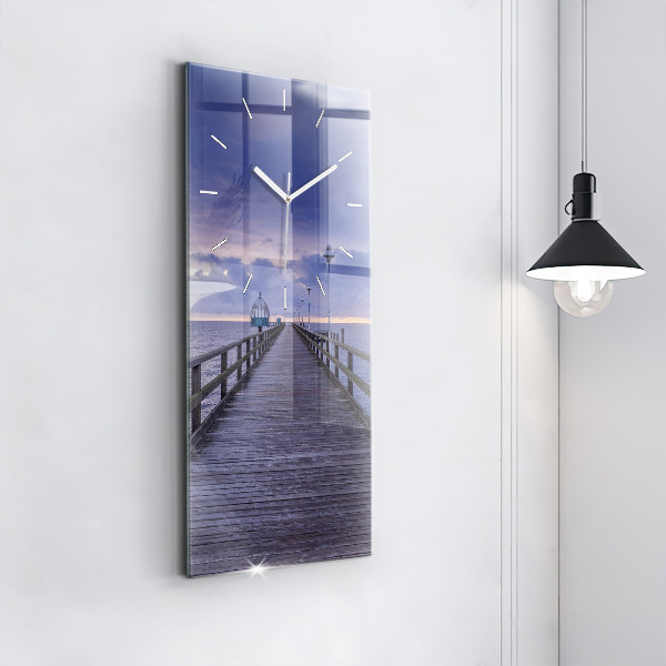 Modern vertical wall clock Pier on the Baltic Sea