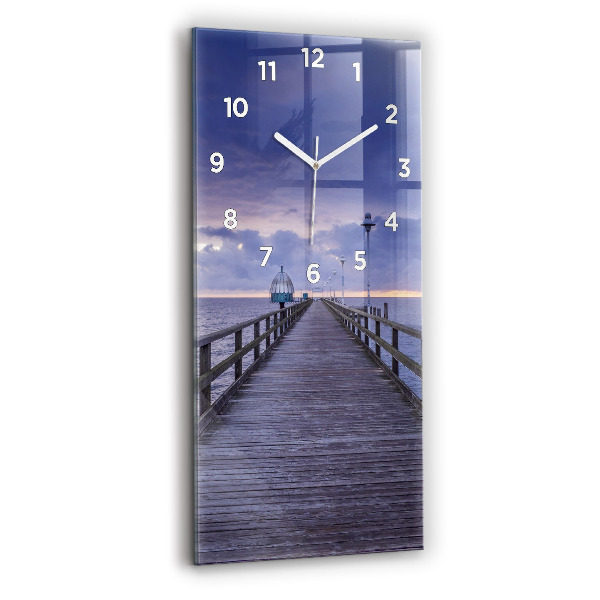 Modern vertical wall clock Pier on the Baltic Sea