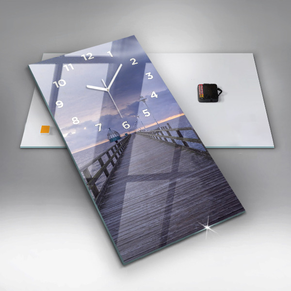 Modern vertical wall clock Pier on the Baltic Sea