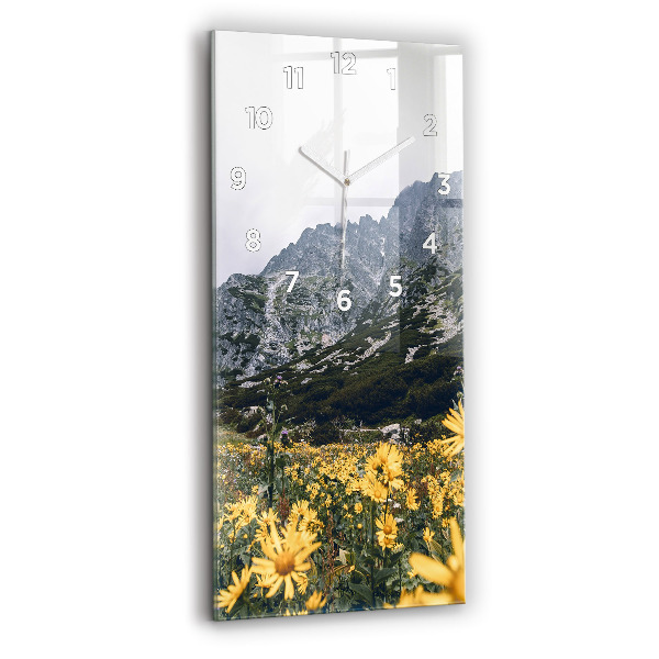 Modern vertical wall clock Meadow flowers in the mountains