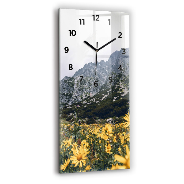 Modern vertical wall clock Meadow flowers in the mountains