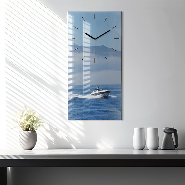 Modern vertical wall clock A boat floating on the ocean