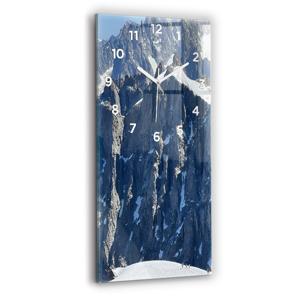 Modern vertical wall clock Alps Mountains in Winter
