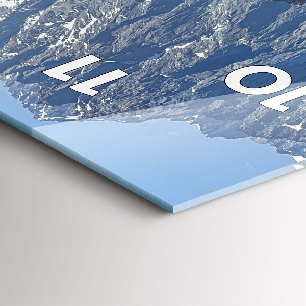 Modern vertical wall clock Alps Mountains in Winter