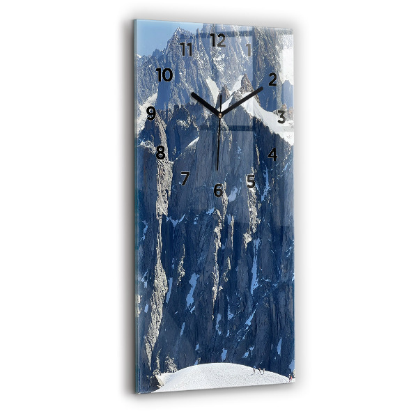 Modern vertical wall clock Alps Mountains in Winter