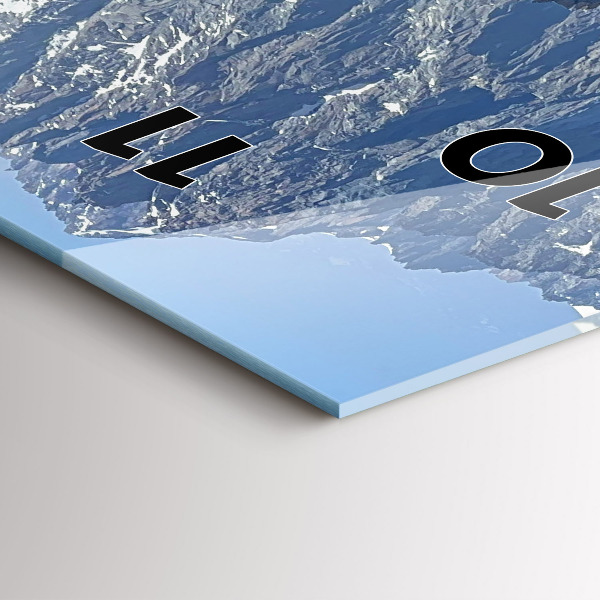 Modern vertical wall clock Alps Mountains in Winter