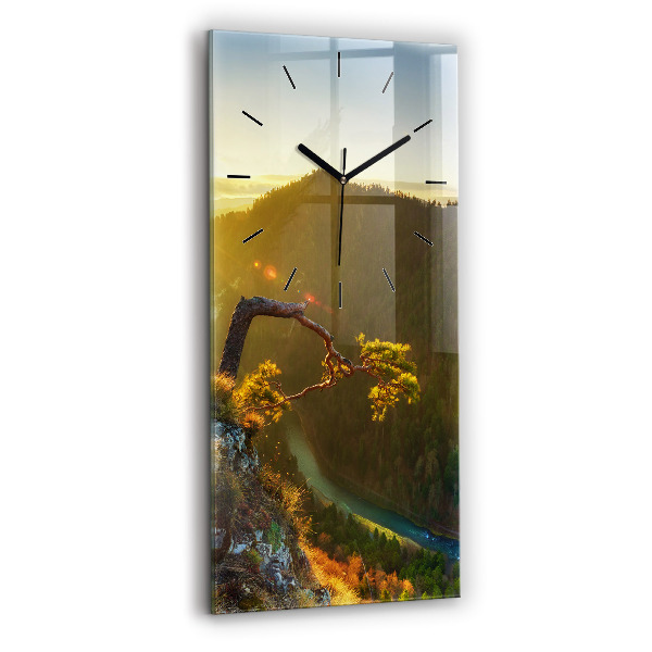 Modern vertical wall clock Sunset over the mountains