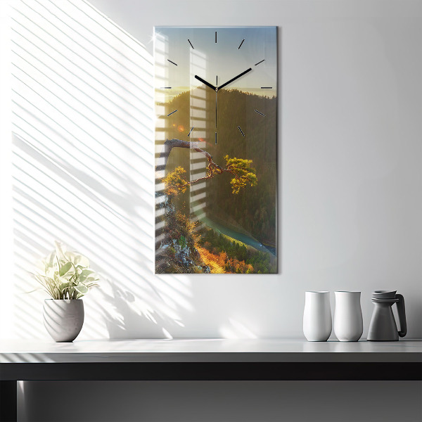 Modern vertical wall clock Sunset over the mountains