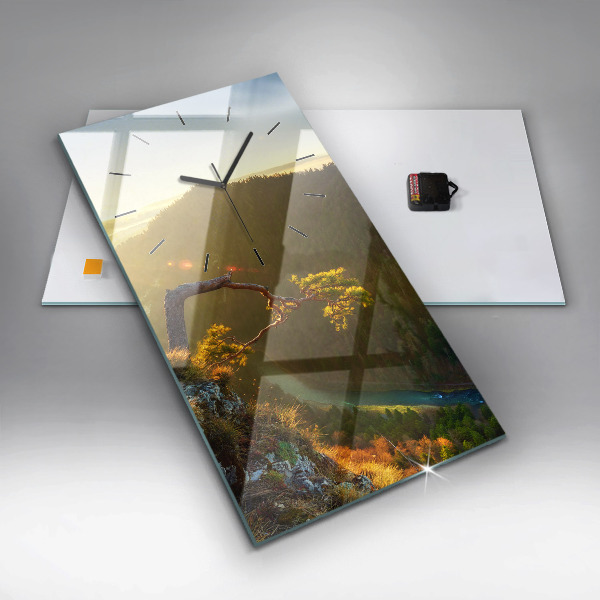 Modern vertical wall clock Sunset over the mountains