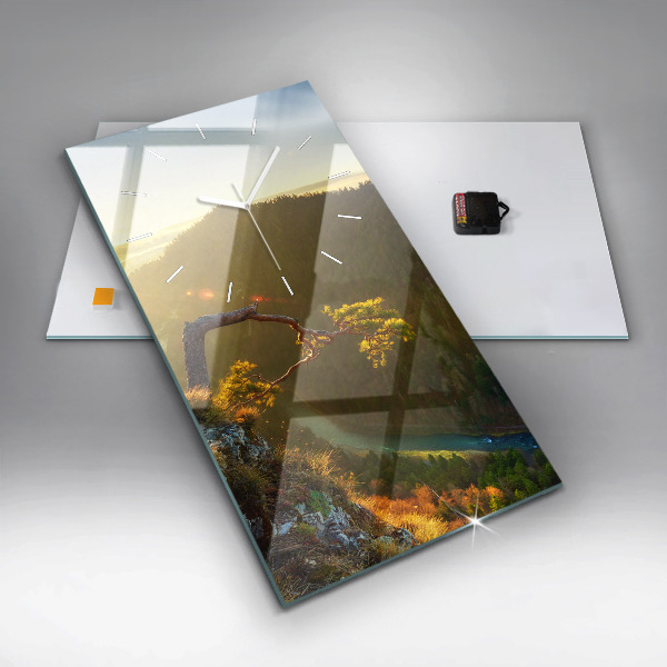 Modern vertical wall clock Sunset over the mountains