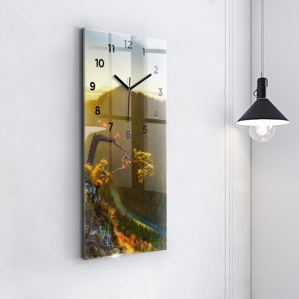 Modern vertical wall clock Sunset over the mountains