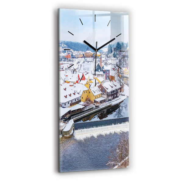 Modern vertical wall clock Panorama of the city in winter