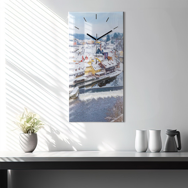 Modern vertical wall clock Panorama of the city in winter