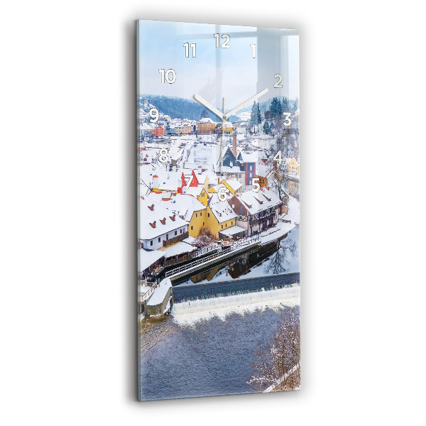 Modern vertical wall clock Panorama of the city in winter