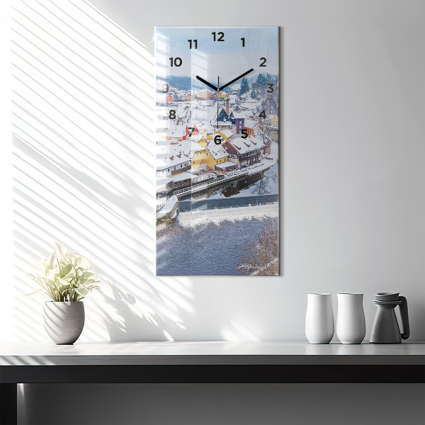 Modern vertical wall clock Panorama of the city in winter