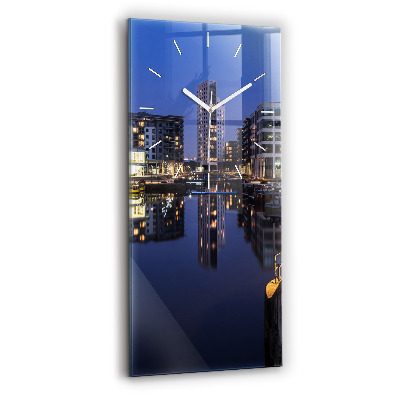 Modern vertical wall clock The city lit up at night