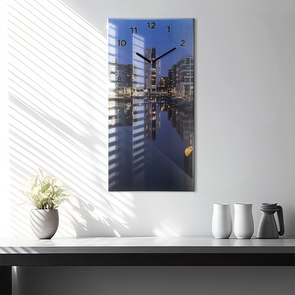 Modern vertical wall clock The city lit up at night