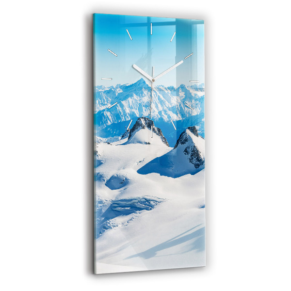 Modern vertical wall clock Skier in the Alps
