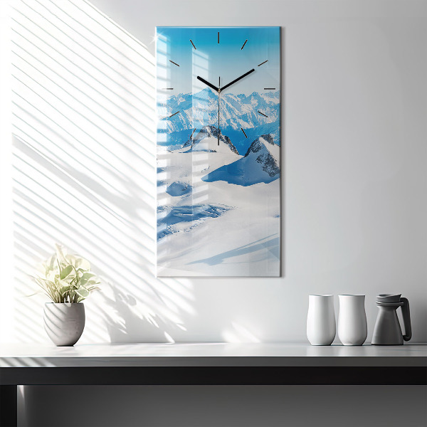 Modern vertical wall clock Skier in the Alps