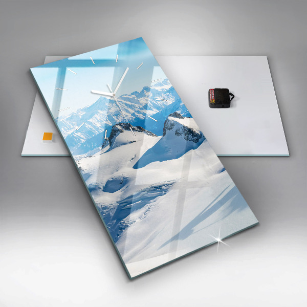Modern vertical wall clock Skier in the Alps