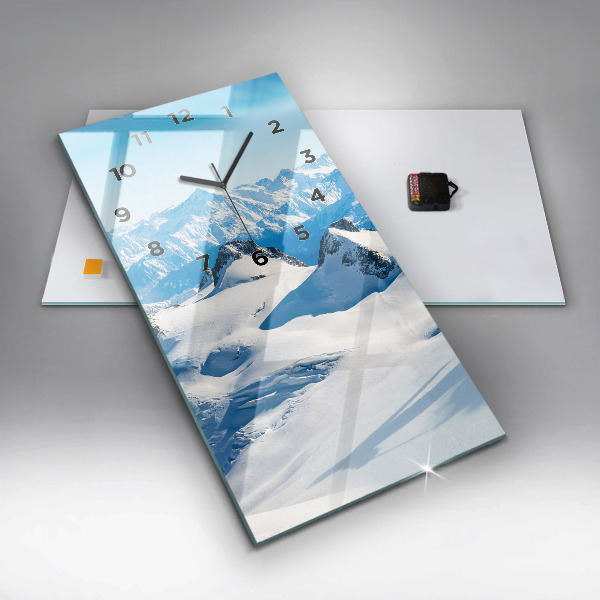 Modern vertical wall clock Skier in the Alps