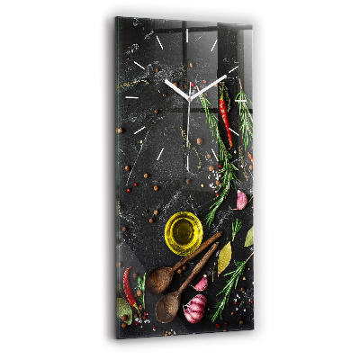 Modern vertical wall clock Spices on the counter
