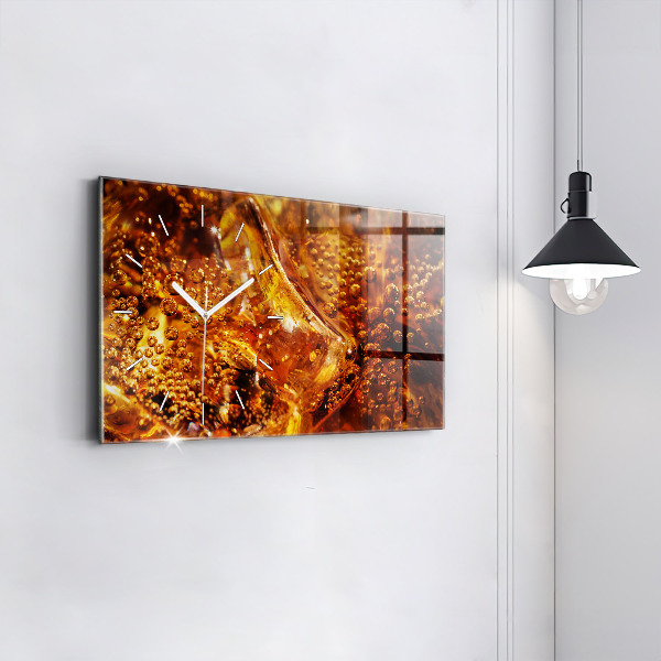 Glass wall clock rectangular Close-up of the drink