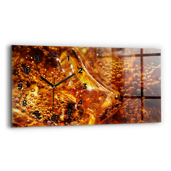 Glass wall clock rectangular Close-up of the drink