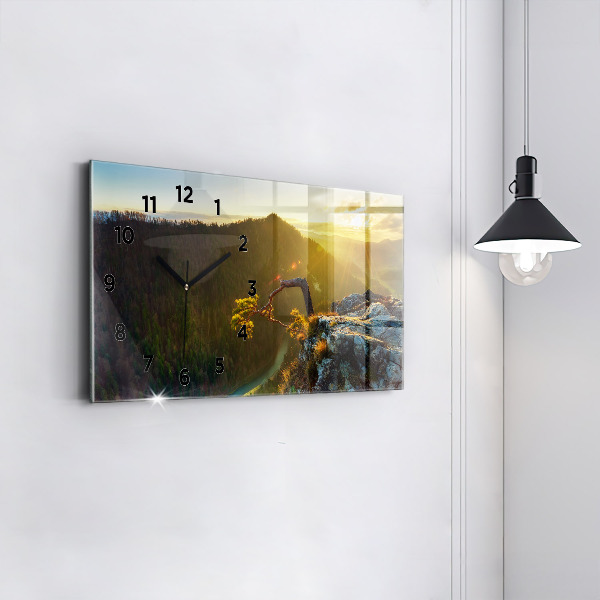Glass wall clock rectangular Sunset over the mountains